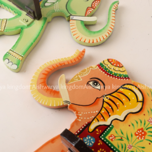 Wooden hand-painted elephant wall shelf
