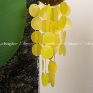 Coconut shell wind chime with colorful shell discs