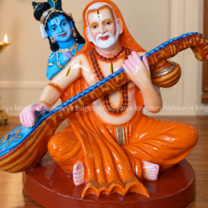 Saint Thyagaraja statue playing veena with Krishna