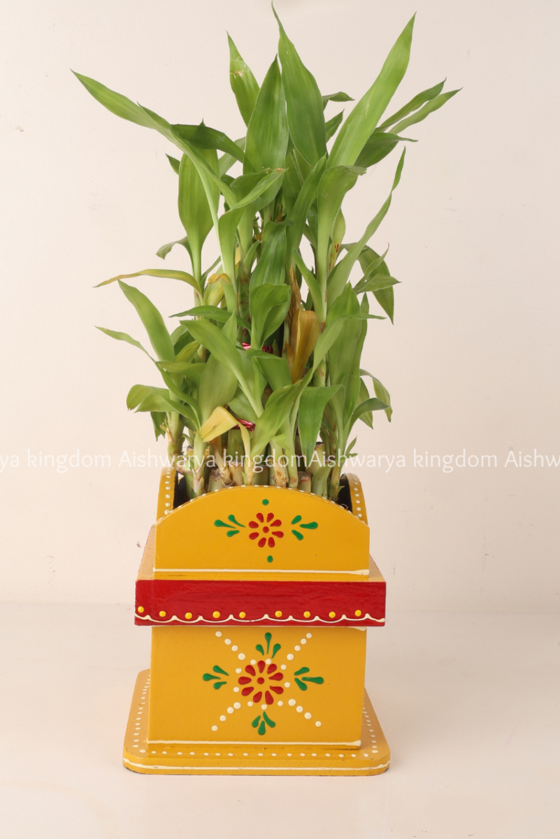 Wooden Tulasi Madam hand painted in yellow and red