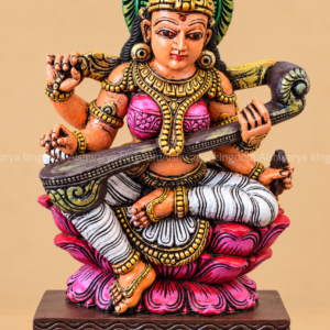 Wooden Saraswati statue with veena sitting on lotus hand painted