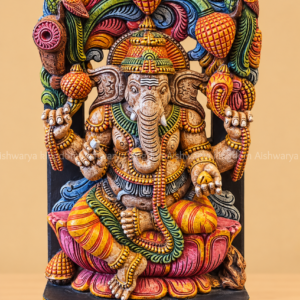 Wooden Ganesha idol with carved arch and parrots hand painted